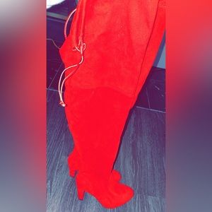 Thigh high red boots